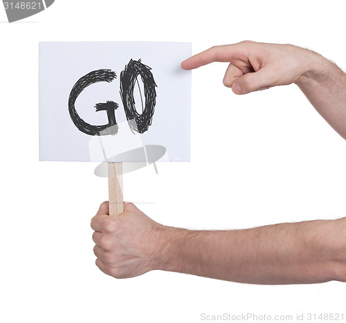 Image of Hand holding sign, isolated on white