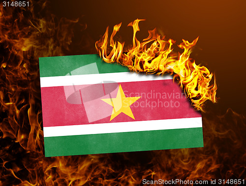 Image of Flag burning - Suriname