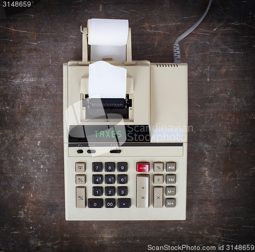 Image of Old calculator - taxes