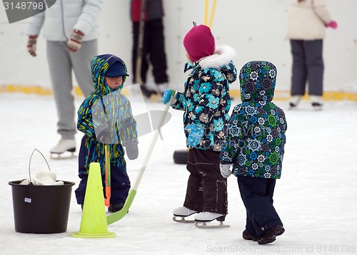 Image of Three hockey players