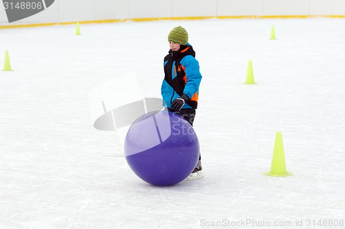 Image of Boy run with a ball