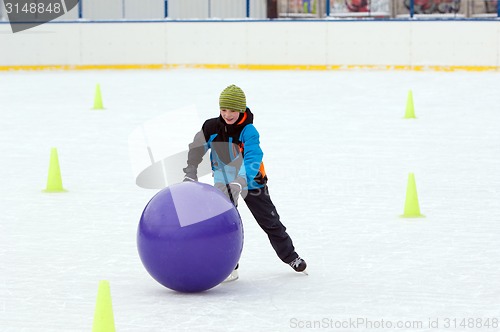 Image of Boy run with a ball