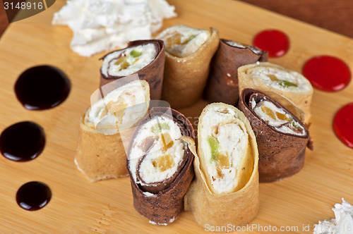 Image of pancake roll with marmalade