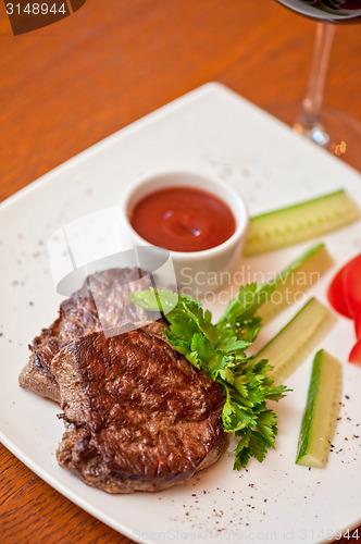 Image of beef meat and wine