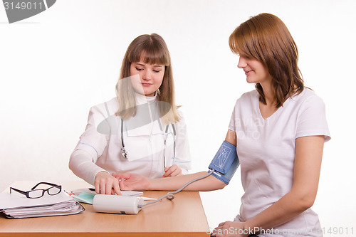 Image of Mereet pressure tonometer doctor girl-patient