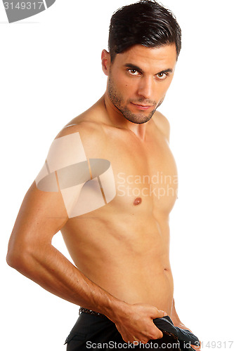 Image of Man undressing over white