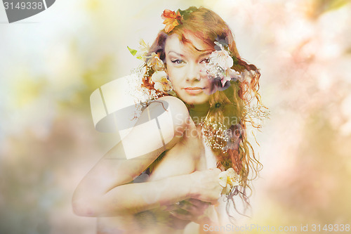 Image of double exposure portrait of young woman in flowers