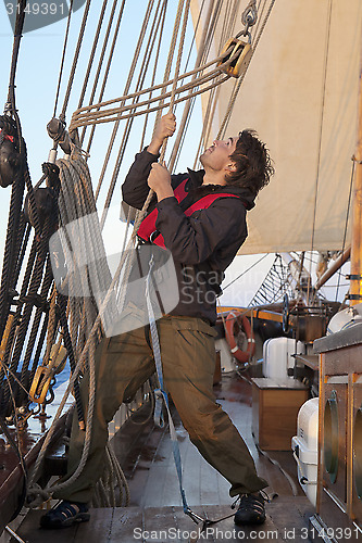 Image of Young sailor at work