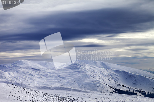 Image of Winter mountains and storm sky