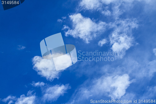 Image of blue sky with white clouds