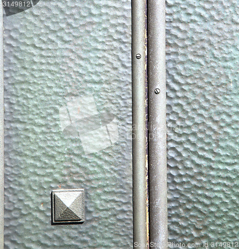 Image of   varese   abstract    r in a  door curch  closed wood  