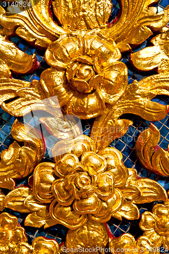 Image of flower  in  gold    temple    bangkok  thailand incision of the 
