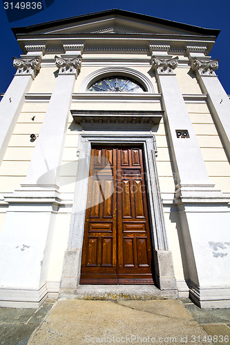 Image of  church  in  the sumirago old   closed   sidewalk italy  