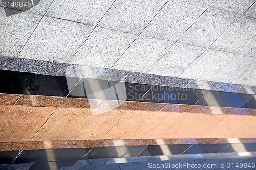 Image of abstract  reflex       pavement cross stone step     the    temp