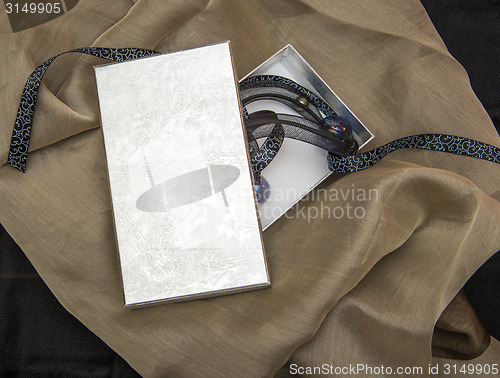 Image of surprise gift box on the fabric