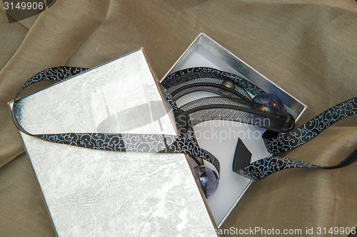Image of surprise gift box on the fabric