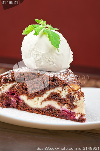 Image of chocolate cake with jam ice cream