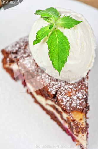 Image of chocolate cake with jam ice cream