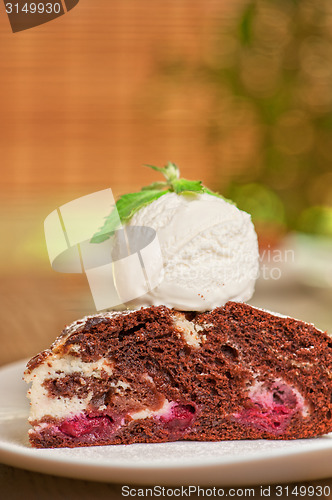 Image of chocolate cake with jam ice cream