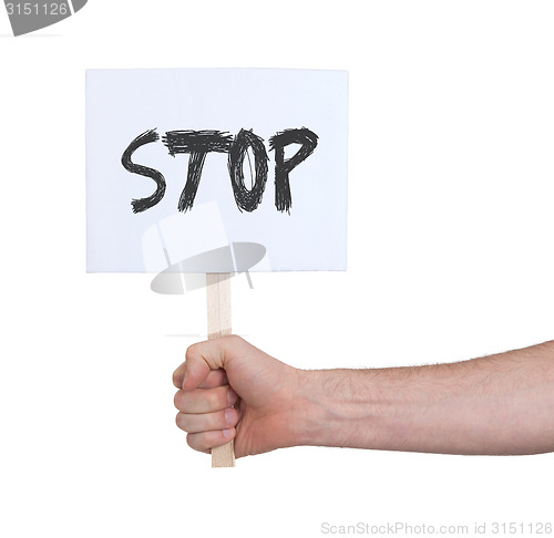 Image of Hand holding sign, isolated on white