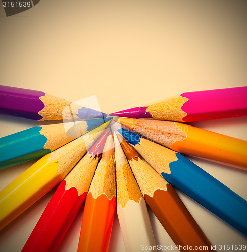 Image of colored pencils on white background