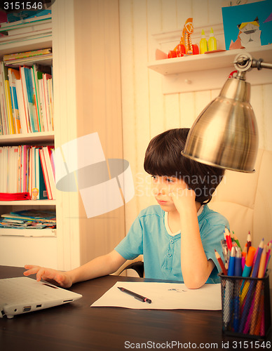 Image of child doing homework