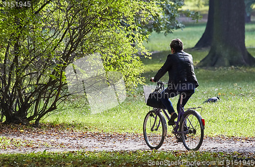 Image of woman on bike 