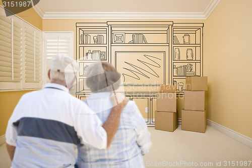 Image of Senior Couple In Empty Room with Shelf Drawing on Wall