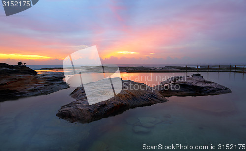 Image of Curl Curl Rock Pool relfections of sunrise