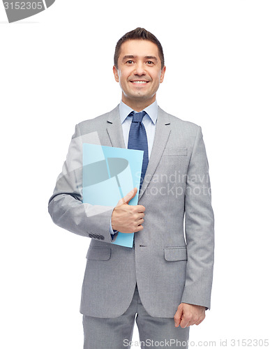 Image of happy businessman holding folder