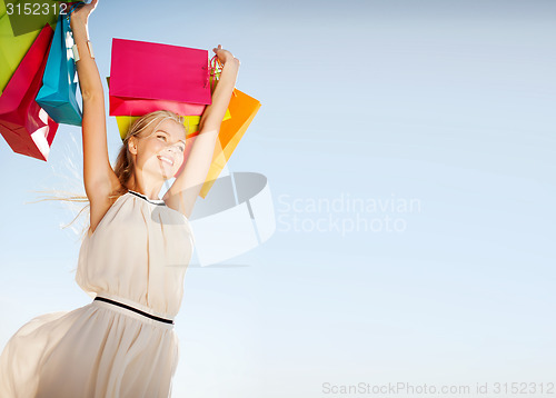 Image of woman with shopping bags