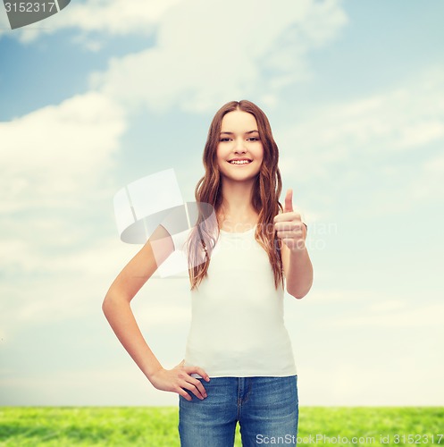 Image of smiling teenager in blank white t-shirt