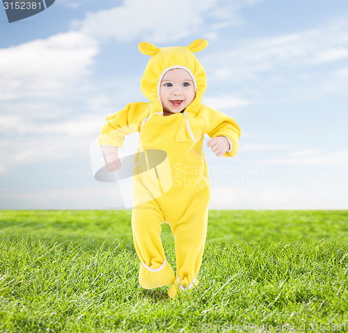 Image of little happy baby making his first steps