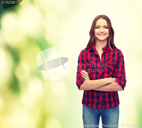 Image of smiling young woman in casual clothes