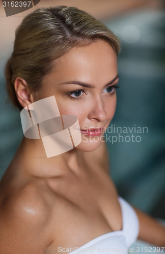 Image of close up of woman in swimsuit at swimming pool