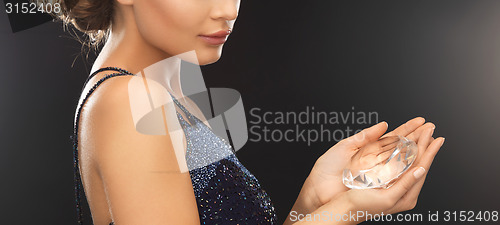 Image of woman with big diamond