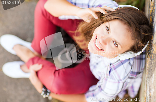 Image of girl with headphones listening to music