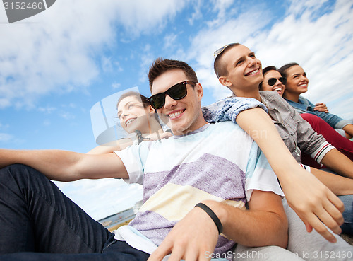 Image of group of teenagers hanging out