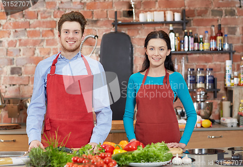 Image of happy couple in kitchen at cooking class