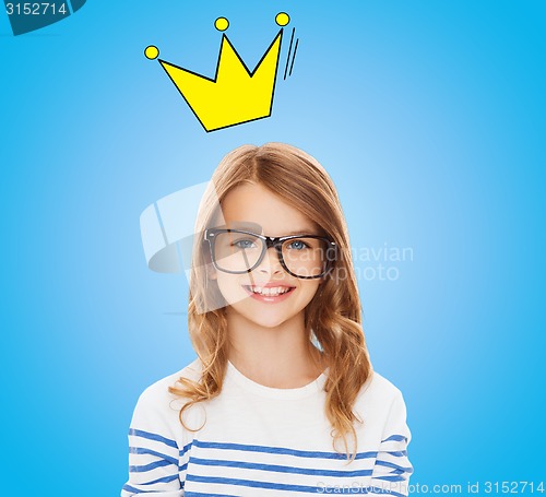 Image of smiling little girl with black eyeglasses