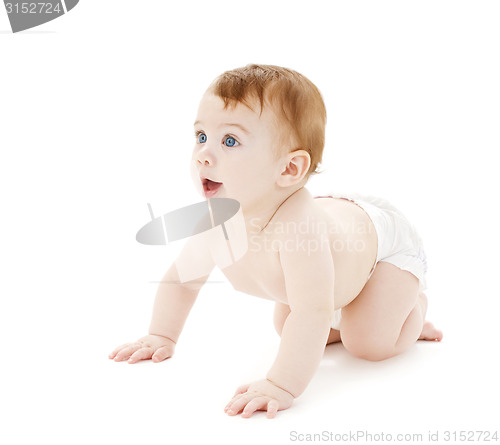 Image of crawling curious baby