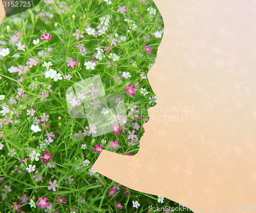 Image of woman silhouette with green floral pattern