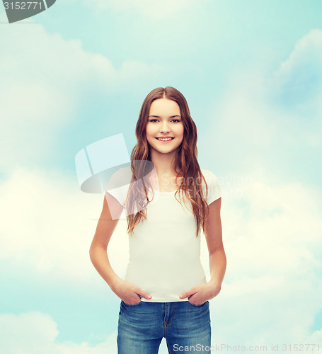 Image of smiling teenager in blank white t-shirt