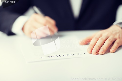 Image of man with contract