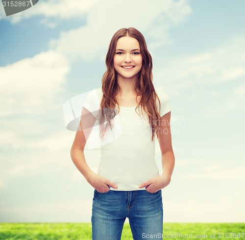 Image of smiling teenager in blank white t-shirt