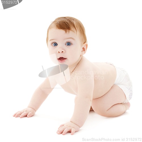 Image of crawling curious baby