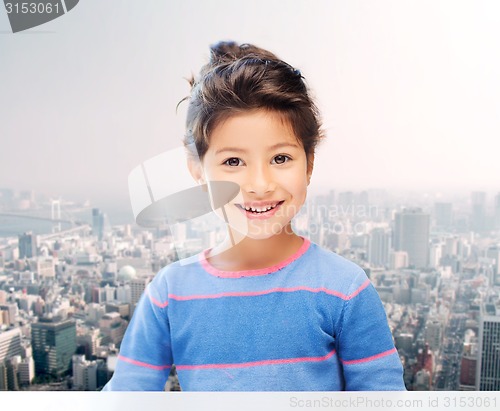 Image of little girl over city background