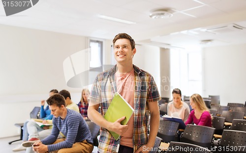 Image of group of smiling students in lecture hall