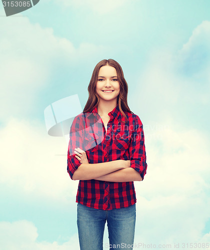 Image of smiling young woman in casual clothes