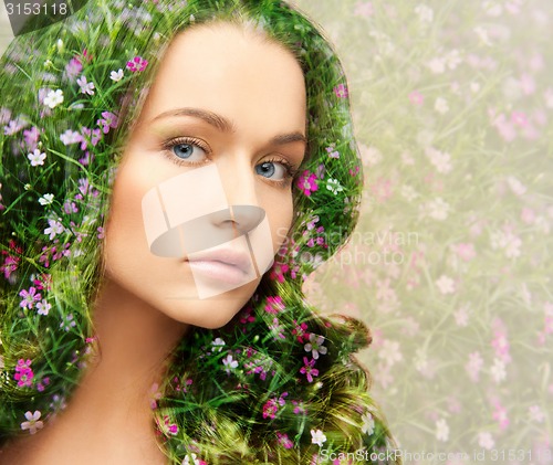 Image of young beautiful woman with floral pattern